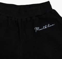 textured black shorts